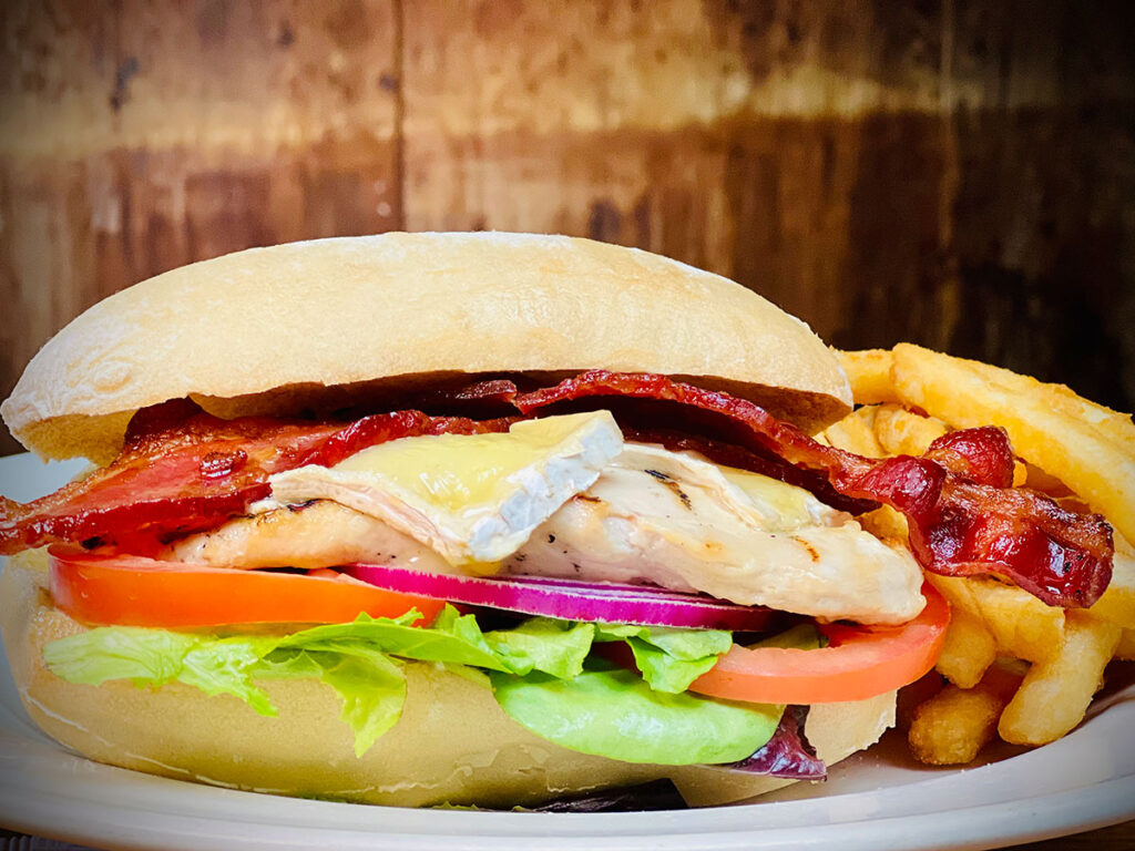 Chicken, Bacon, & Brie Sandwich with French fries